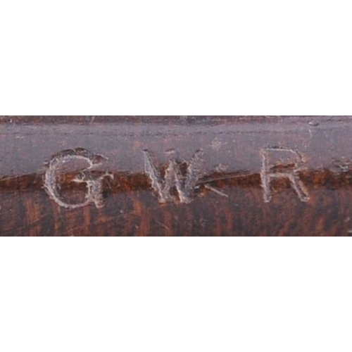 911 - Police truncheon, varnished wood with leather strap, the end clearly stamped GWR.