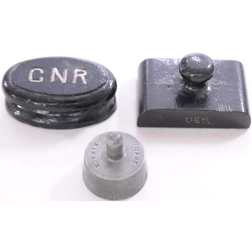 972 - Paperweights, GNR oval, GER and small circular marked RUNNING SHED, the base marked Newton Abbott in... 