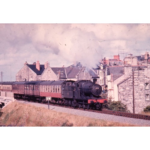 168 - Two photo book wooden boxes of 220 glass mounted 35mm colour slides, all appear to be remounted from... 