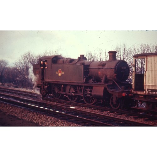 168 - Two photo book wooden boxes of 220 glass mounted 35mm colour slides, all appear to be remounted from... 