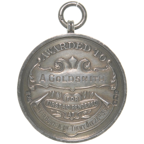 11 - A Midland Railway Ambulance silver medallion, A GOLDSMITH, Awarded For First Aid Rendered at Burton-... 