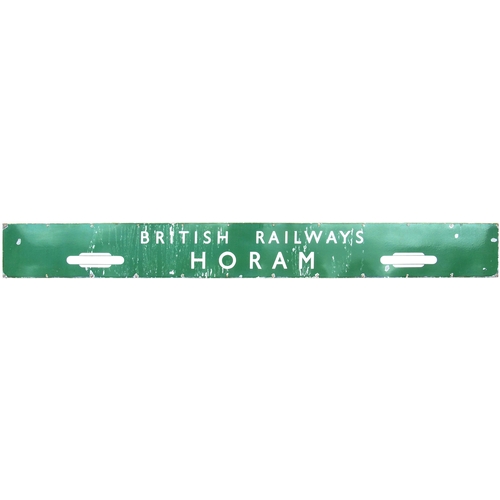 A BR(S) station sign, BRITISH RAILWAYS, HORAM, from the Cuckoo Line between Eridge and Polegate. The station closed in 1965. Enamel, 105"x11½", excellent colour and shine, a number of small face chips. (Dispatch by Mailboxes/Collect from Banbury Depot)