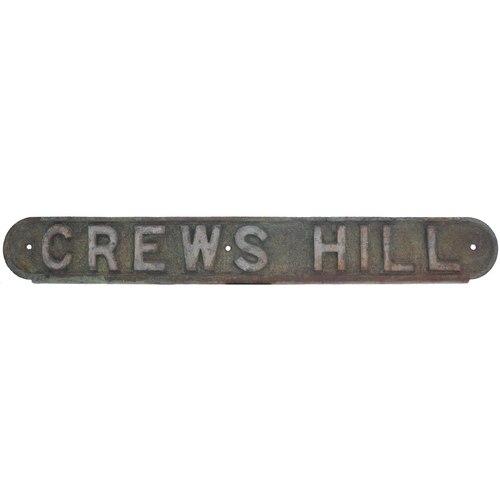 202 - An LNER seat back plate, CREWS HILL, from a station on the Hertford loop. Cast iron, length 32