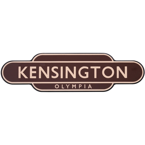 266 - A BR(W) totem sign, KENSINGTON OLYMPIA, (f/f), from the West London line between Clapham Junction an... 