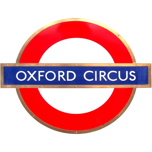 335 - A London Transport station sign, OXFORD CIRCUS, enamel, with bronze surround, 44