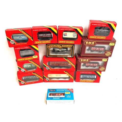 722 - Selection of OO gauge boxed Hornby, Mainline & GMR & Peco wagon kit in good condition. (14) (D4) (Di... 