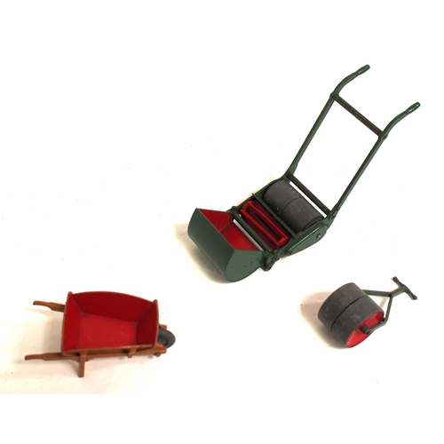 767 - Dinky Super Toys 1950s lawnmower set including grass roller, wheel barrow & working push lawnmower &... 