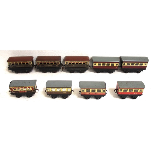 850 - Quantity of Hornby tinplate wagons & coaches all in reasonably good condition including three Pullma... 