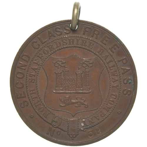 123 - A North Staffordshire Railway second class free pass, copper with coat of arms and conditions of iss... 