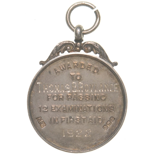 346 - An LNWR ST John Ambulance medallion, Thomas B Roylance, For Passing Twelve Examinations, 192, silver... 