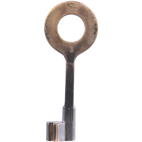 444 - A single line key token, WESTERFIELD-DERBY ROAD, (brass), from the Ipswich to Felixstowe branch. (Po... 