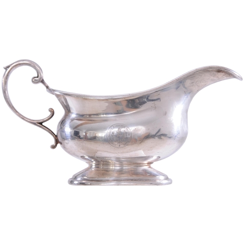 448 - An LMS gravy boat, by Walker and Hall, a classic design with full company coat of arms. Overall leng... 