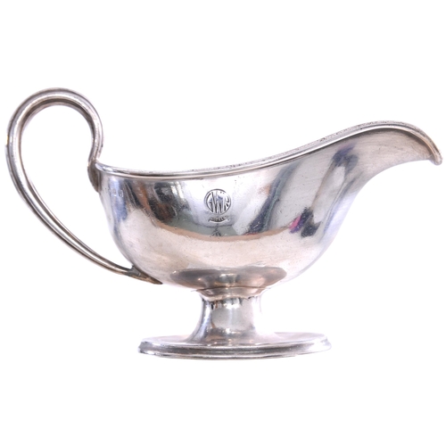 6 - A GWR gravy boat, by Elkington, the side marked with the GWR Hotels roundel, silver plate, overall l... 