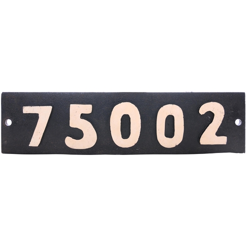 93 - A replacement smokebox numberplate, 75002, a thick steel backplate with numbers riveted from the rea... 