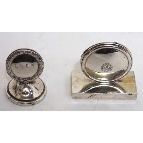 770 - LMS & LNER plated table menu holders, crisp engraving, LMS has a little folding on top disc rim. (2)... 