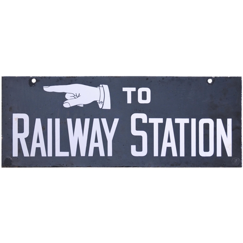 69 - A direction sign, TO RAILWAY STATION, with pointing hand. Double-sided, enamel, 22¾