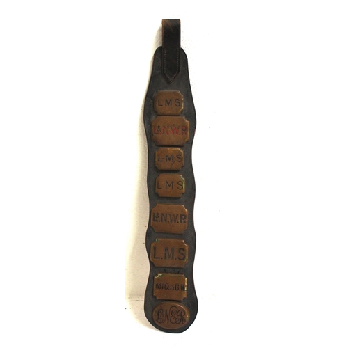 395 - Eight Horse brasses on leather strap - LMS, L&NWR (red wax), MID & GN, LNER. (8) (DRAW) (Dispatch by... 