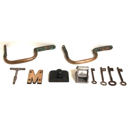 839 - Miscellaneous carriage fittings etc, LNWR brass grab rails (2), BR tip up ashtray, GER C/I paperweig... 