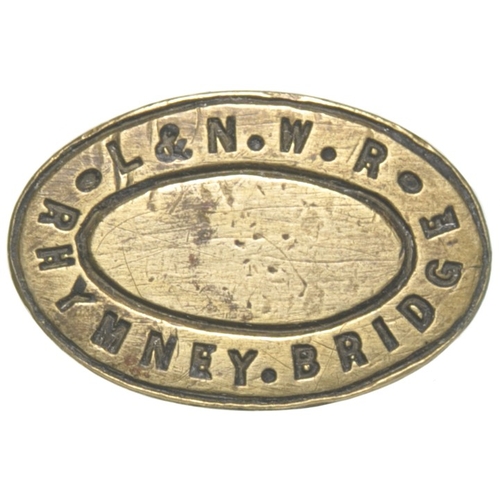 12 - A booking office seal, RHYMNEY BRIDGE, L.&N.W.R, from the Abergavenny to Merthryr route. The station... 