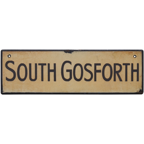 An LNER lamp tablet, SOUTH GOSFORTH, (f/f), from the Tyneside circular route, enamel, 16"x5", slightly discoloured, two edge chips and two small holes top left and right. (Dispatch by Mailboxes/Collect from Banbury Depot)