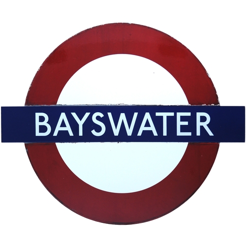 A London Transport target sign, BAYSWATER, enamel, three panels, 32¼ ...