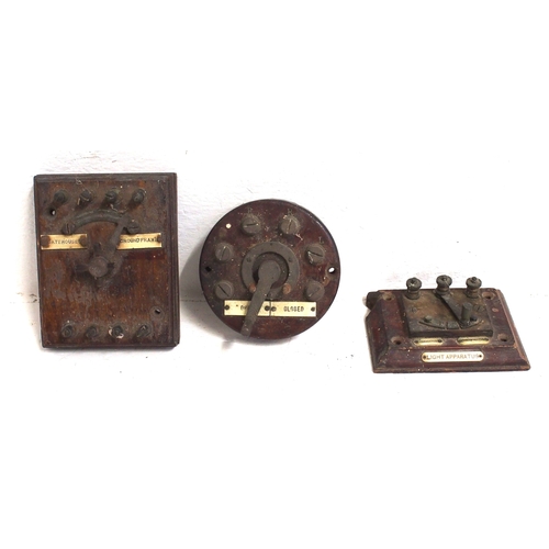 Early signalling circuit switches plates "GATEHOUSE/GROUND FRAME", "LIGHT APPARATUS CONNECTED/DISCONNECTED" & "OPEN / CLOSED", all with hardwood backplate & brass fittings. (3) (B2X) (Dispatch by Mailboxes/Collect from Banbury Depot)