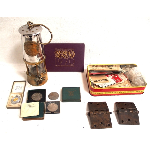 Miscellaneous delve - Eccles Manchester Miner's safety lamp plated No 17 good condition, box of luggage labels, GWR noted, 1970 Royal Mint presentation pack of pre decimal coins, Carriage brass hinges ex Lancing, Festival of Britain 1951 medals (2) both in original boxes, Queen Elizabeth 1977 Silver Jubilee medal & 1955 Crown. (D3X) (Dispatch by Mailboxes/Collect from Banbury Depot)