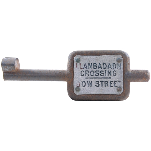 524 - A single line key token, LLANBADARN CROSSING-BOW STREET, (cast steel/engraved metal plate), the fina... 
