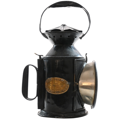 29 - An LBSCR three aspect handlamp, the side stamped B587 SINGLETON, a station on the Chichester to Midh... 