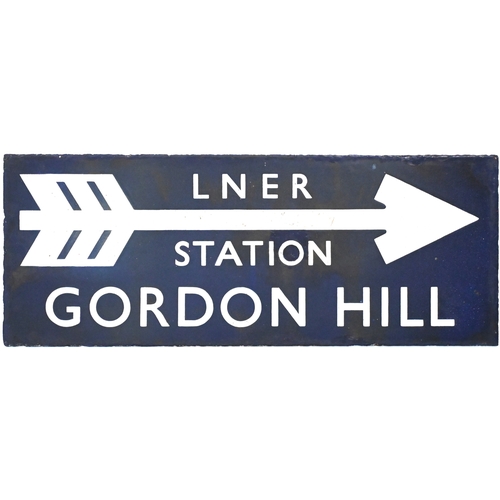 47 - An LNER direction sign, LNER STATION, GORDON HILL,(flangeless), from the Hertford Loop. Enamel, 24¾