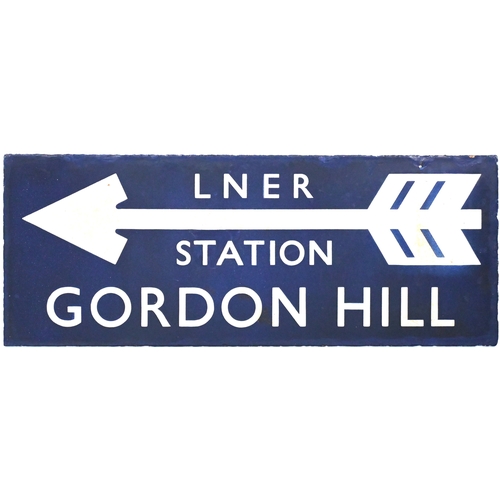 47 - An LNER direction sign, LNER STATION, GORDON HILL,(flangeless), from the Hertford Loop. Enamel, 24¾