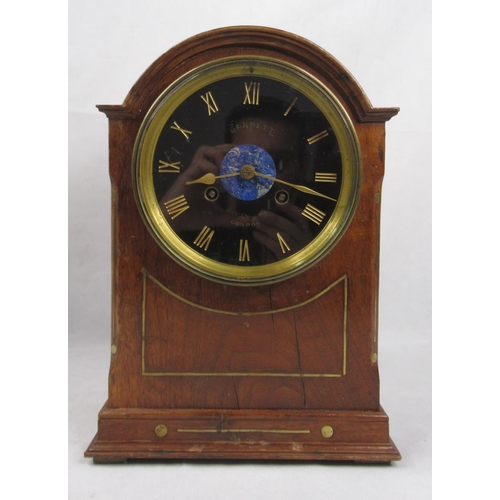 10 - A Mahogany Cased mantel Clock, Bennett London. Domed top and brass inlay with lapis lazuli disk inse... 