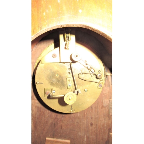 10 - A Mahogany Cased mantel Clock, Bennett London. Domed top and brass inlay with lapis lazuli disk inse... 