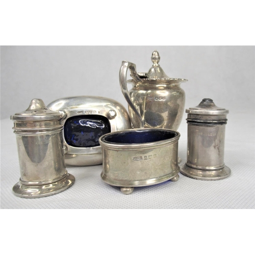33 - Five Pieces of Silver Condiments inc. Salt & Pepper Shakers, Salt, Mustard Pots. With Blue Glass Lin... 