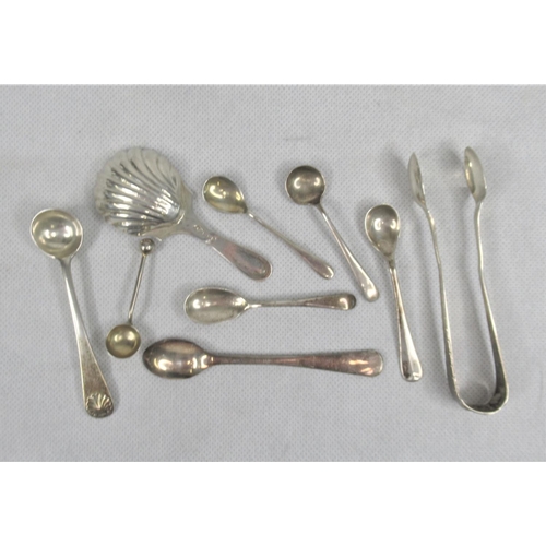 36 - A Silver Caddy Spoon together with Seven Mustard/Salt Spoons & Sugar Nips. Silver weight approx. 80g... 