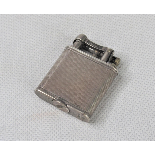 37 - A 1930s Dunhill Silver Cigarette Lighter.