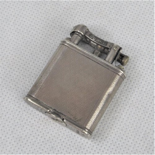 37 - A 1930s Dunhill Silver Cigarette Lighter.