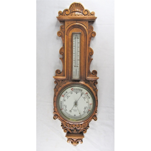 7 - A Late Victorian / Early Edwardian Carved Honey Oak Hall Barometer, Benetfink & Co. Ltd, Cheapside L... 