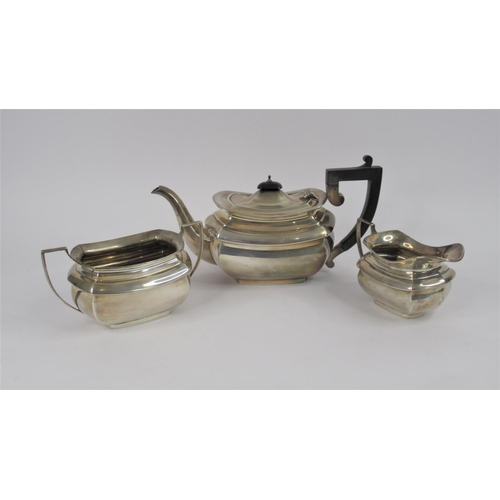 20 - A Three Piece Silver Tea Set, hallmarked Birmingham 1931 by Henry Clifford Davis. Comprising teapot,... 