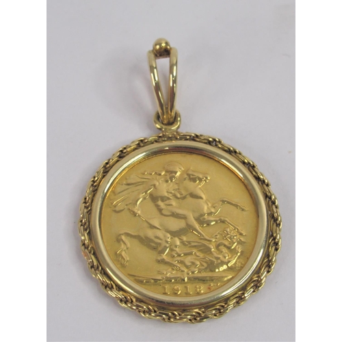 25 - A 1918 Gold Sovereign Set in 18ct .750 Yellow Gold Mount. Total weight approx. 12.7g.