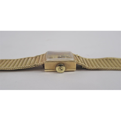 43 - A 9ct Yellow Gold Lady's Tissot bracelet Watch. Working order. Square case approx. 1.4cm. Total weig... 