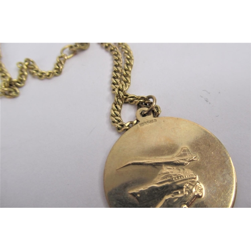 45 - A 9ct .375 Yellow Gold St Christopher pendent on 9ct gold chain. Together with a 9ct gold wedding ba... 