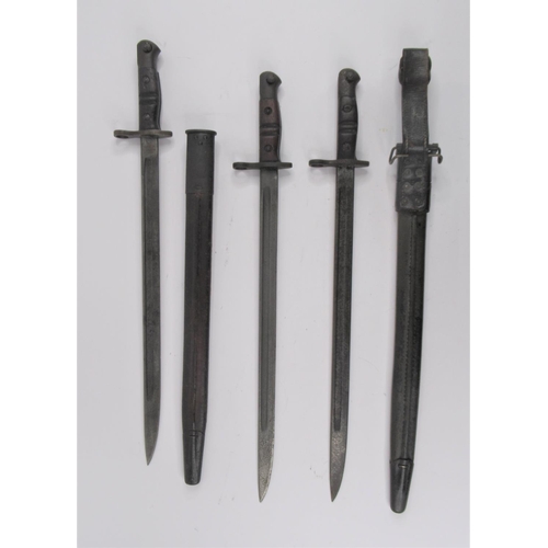 57 - Three US M1917 Pattern Sword Bayonets. Two bearing both British & US proof marks. All three with Rem... 