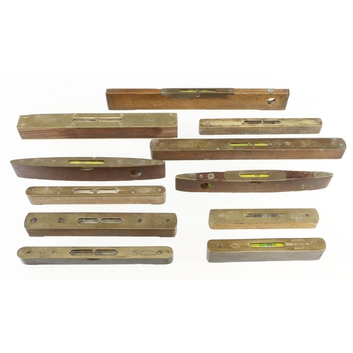 137 - Nine brass topped levels and two others G