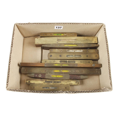 137 - Nine brass topped levels and two others G