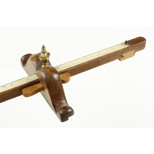 153 - An early panel gauge made with 5 different woods and inlaid with a 20