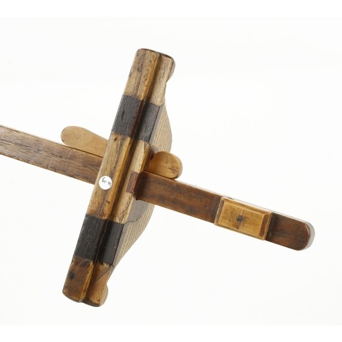 153 - An early panel gauge made with 5 different woods and inlaid with a 20