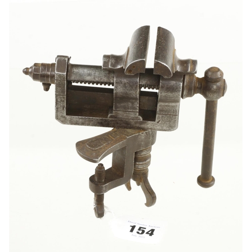 154 - An early clockmaker's adjustable vice with 2