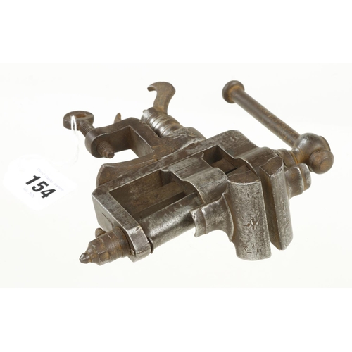 154 - An early clockmaker's adjustable vice with 2