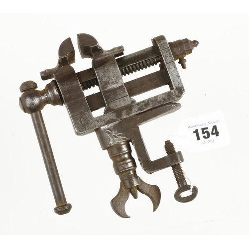 154 - An early clockmaker's adjustable vice with 2
